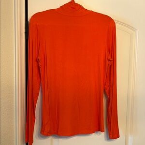 Elegant Long Sleeve Turtleneck Top in Bold Orange